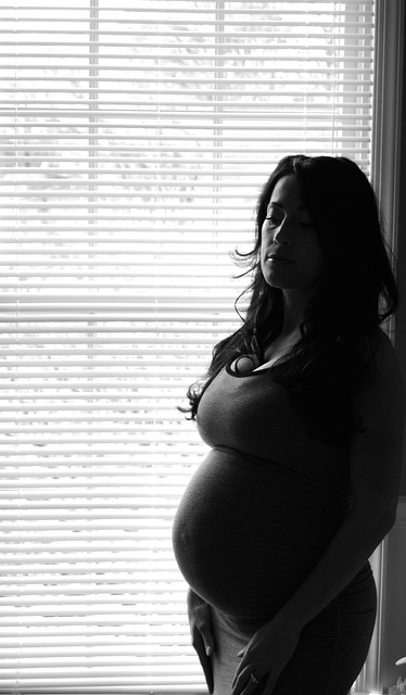 Pregnant woman in black and white.