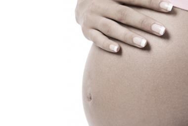 Hand on pregnany belly