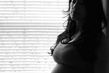 Pregnant woman in black and white.