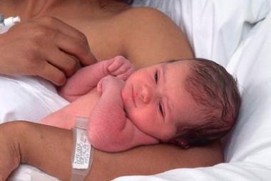 Woman holding infant